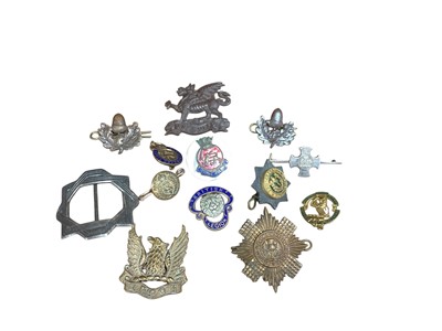 Lot 809 - Second World War Sweetheart brooch in the form of a Distinguished Service Cross, together with various other regimental badges.