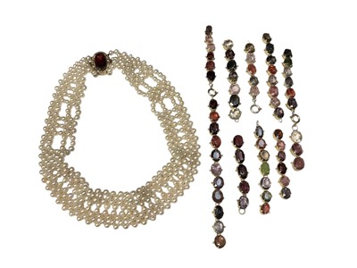 Lot 143 - Cultured pearl choker necklace with a gold mounted oval garnet clasp, together with various pieces of gilt metal mounted multi-gem necklace
