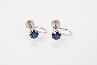 Lot 653 - Pair of single stone blue sapphire earrings in claw setting with 18ct white gold crew back fittings