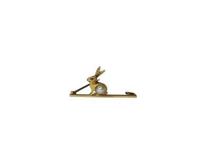 Lot 147 - Victorian 15ct gold, pearl and yellow enamelled rabbit bar brooch