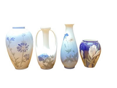 Lot 1172 - Four Royal Copenhagen vases decorated with flowers, largest is 18.5cm