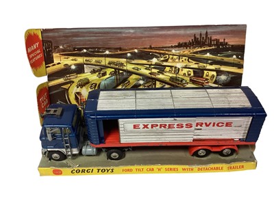 Lot 1800 - Corgi Major diecast Ford Tilt Cab "H" Series with detachable trailer, No.1137 & Carrimore Low-Loader, No.1100 (x2), all in poor boxes and Simon Snorkel Fire Engine, boxed No.1127 (4)