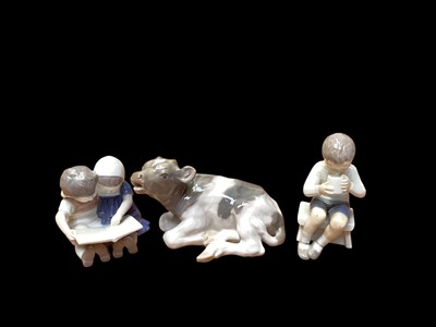 Lot 1178 - Royal Copenhagen model of a calf, no.1072, together with two Bing & Grondahl figures 1713 and 1567 (3)