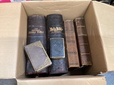 Lot 1479 - Two photograph albums containing Victorian and Edwardian photographs, together with two large family bibles and two prayer books