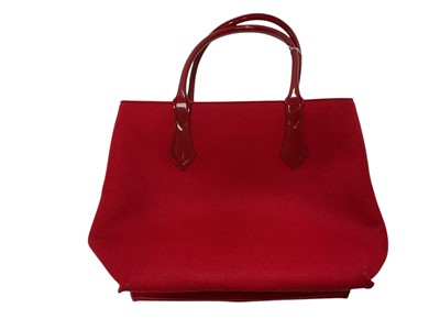 Lot 2097 - Vivienne Westwood large red felt tote bag with soft dust bag