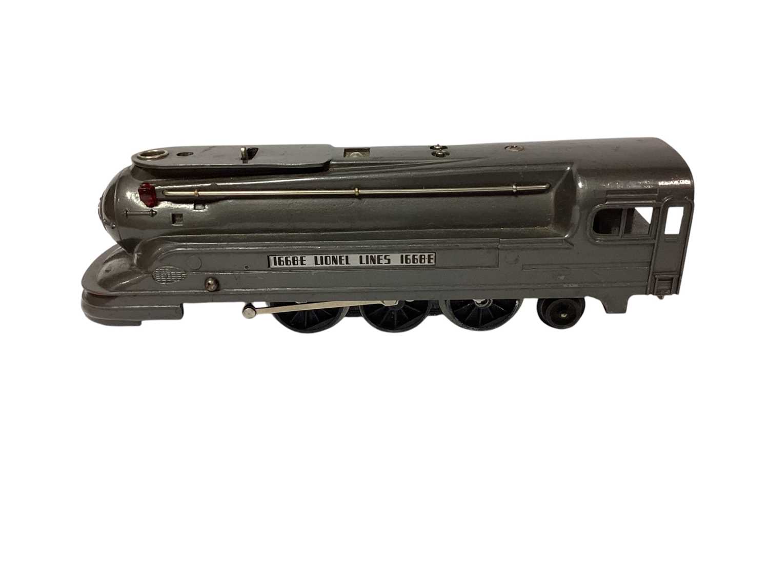 Lot 1860 - Lionel Lines O Gauge locomotive & Tender, with tin plate coaches & rolling stock, plus track, Platforms and scenery and OO Gauge track