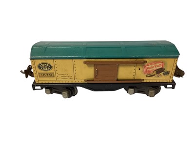 Lot 1860 - Lionel Lines O Gauge locomotive & Tender, with tin plate coaches & rolling stock, plus track, Platforms and scenery and OO Gauge track