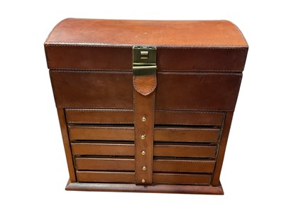 Lot 52 - Large brown leather domed top jewellery box with hinged lid and five draws below