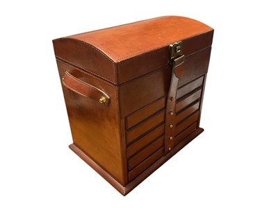 Lot 52 - Large brown leather domed top jewellery box with hinged lid and five draws below