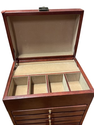 Lot 52 - Large brown leather domed top jewellery box with hinged lid and five draws below