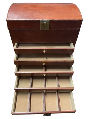 Lot 52 - Large brown leather domed top jewellery box with hinged lid and five draws below