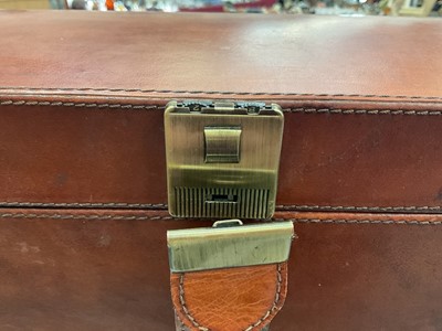 Lot 52 - Large brown leather domed top jewellery box with hinged lid and five draws below
