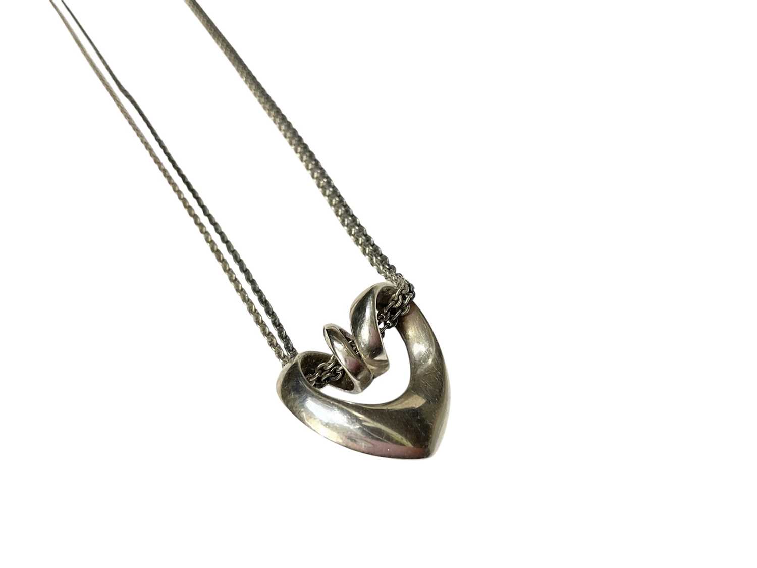 Lot 118 - Georg Jensen Danish silver spiral heart pendant on original silver double cable link chain