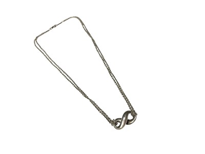 Lot 119 - Tiffany & Co. silver infinity pendant on original silver double cable link chain