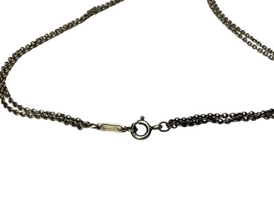 Lot 119 - Tiffany & Co. silver infinity pendant on original silver double cable link chain