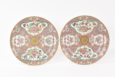 Lot 159 - Pair of 19th century Chinese porcelain plates with famille rose decoration on a pink ground