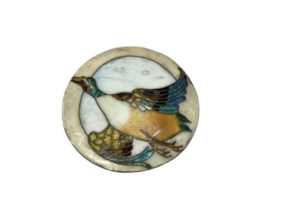 Lot 121 - Arts and Crafts period enamelled roundel decorated with a flying duck