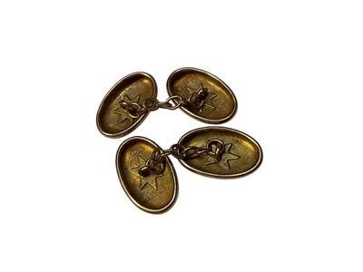 Lot 61 - Pair of antique 9ct gold cufflinks, the oval panels with engraved floral scroll decoration (Birmingham 1919)