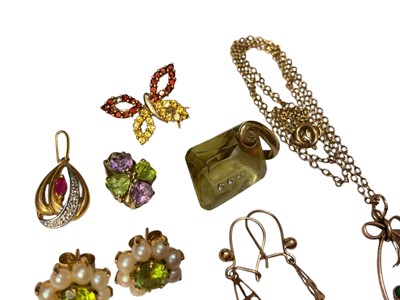 Lot 63 - Group of 9ct gold jewellery to include gem set pendants, gem set butterfly brooch, two pairs of cameo earrings, pair of peridot and seed pearl flower head earrings and a turquoise pendant on cha...
