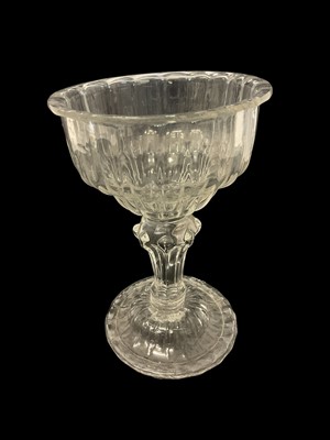 Lot 155 - George III glass sweet meat raised on domed pedestal foot, 14.5cm in height.