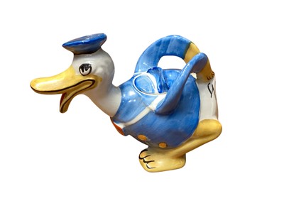 Lot 1193 - 1930's Wade Heath Novelty Donald Duck milk jug with printed marks to base.