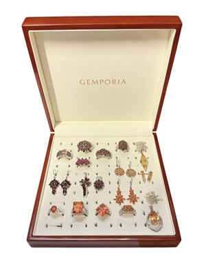 Lot 76 - Group of Gemporia silver garnet and other gem set dress rings, earrings and pendants in a fitted ring display case