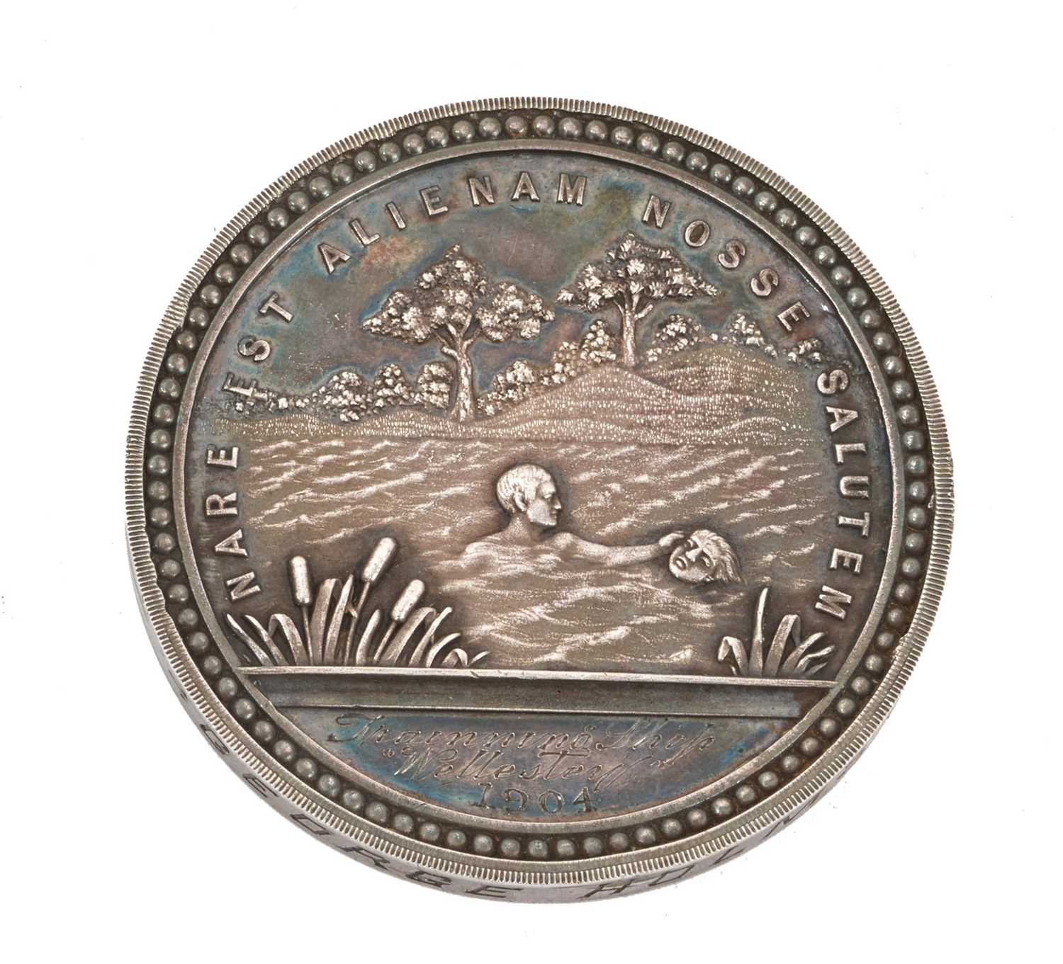 Lot 13 - Edwardian Royal Humane Society Silver Swimming Proficiency medal (54mm), EF, named to George Holms, training ship Wellestery, 1904. In Elkington & Co box of issue. Provenance: Property...