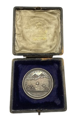 Lot 13 - Edwardian Royal Humane Society Silver Swimming Proficiency medal (54mm), EF, named to George Holms, training ship Wellestery, 1904. In Elkington & Co box of issue. Provenance: Property...