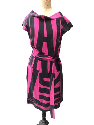 Lot 2123 - Vivienne Westwood Anglomania 'Backtorch' dress in black and fuchsia. New with tags.