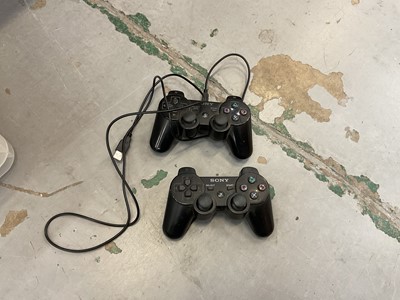 Lot 1988 - Sony PlayStation 3 together with a large collection of games approximately 130 games and two controllers