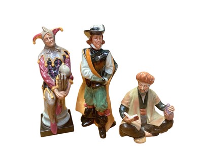 Lot 1204 - Three Royal Doulton figures - The Jester HN2016, Cavalier HN2718 and Omar Khayyam HN2247
