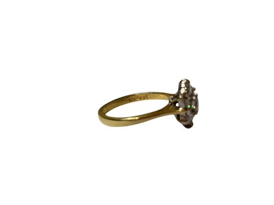 Lot 111 - 18ct gold diamond flower head cluster ring