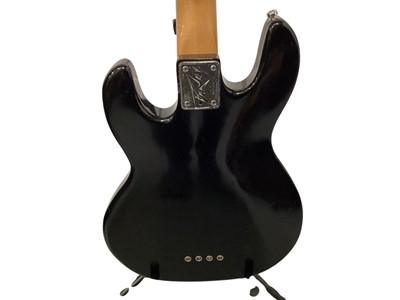 Lot 2234 - Peavey T-40 1981 Bass, Serial No.00739751 & Mono M8O Series Guitar Bag (2)