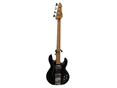 Lot 2234 - Peavey T-40 1981 Bass, Serial No.00739751 & Mono M8O Series Guitar Bag (2)