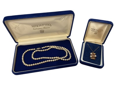 Lot 149 - Cultured pearl necklace in a Mikimoto box and a Mikimoto 9ct gold cultured pearl and garnet pendant on chain, in box