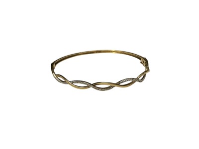 Lot 114 - 9ct gold diamond set woven hinged bangle