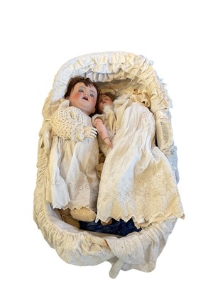 Lot 2707 - A charming group of three antique dolls together with a facsimile photograph of the original owner (born in 1913) as a child playing with these dolls, Molly, Isabel and baby doll. Large Kammer &...