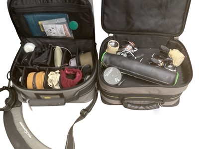 Lot 2432 - Two cases of fishing reels and other accessories, including Trudex, Match Aerial, Mitchell, Scientific Anglers, Troutseeker, Hardy Marksman 4/5, etc