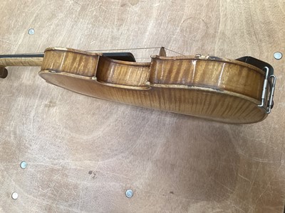 Lot 2209 - Antique violin in case, two-piece back measuring 35.75cm, with two bows, one marked Tourte(?)