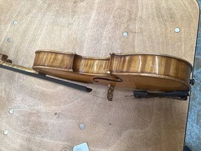 Lot 2209 - Antique violin in case, two-piece back measuring 35.75cm, with two bows, one marked Tourte(?)