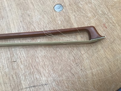 Lot 2209 - Antique violin in case, two-piece back measuring 35.75cm, with two bows, one marked Tourte(?)