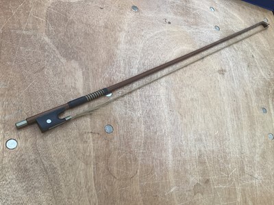 Lot 2209 - Antique violin in case, two-piece back measuring 35.75cm, with two bows, one marked Tourte(?)