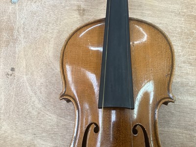 Lot 2209 - Antique violin in case, two-piece back measuring 35.75cm, with two bows, one marked Tourte(?)