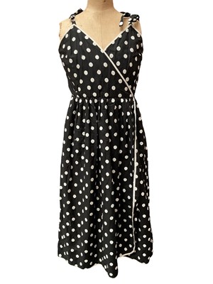 Lot 2127 - Group of vintage women's clothing including Guy Laroche Boutique Paris black and white polka dot sundress with cross-over front. Bellville Sassoon black wool skirt suit with gilt button and brai...