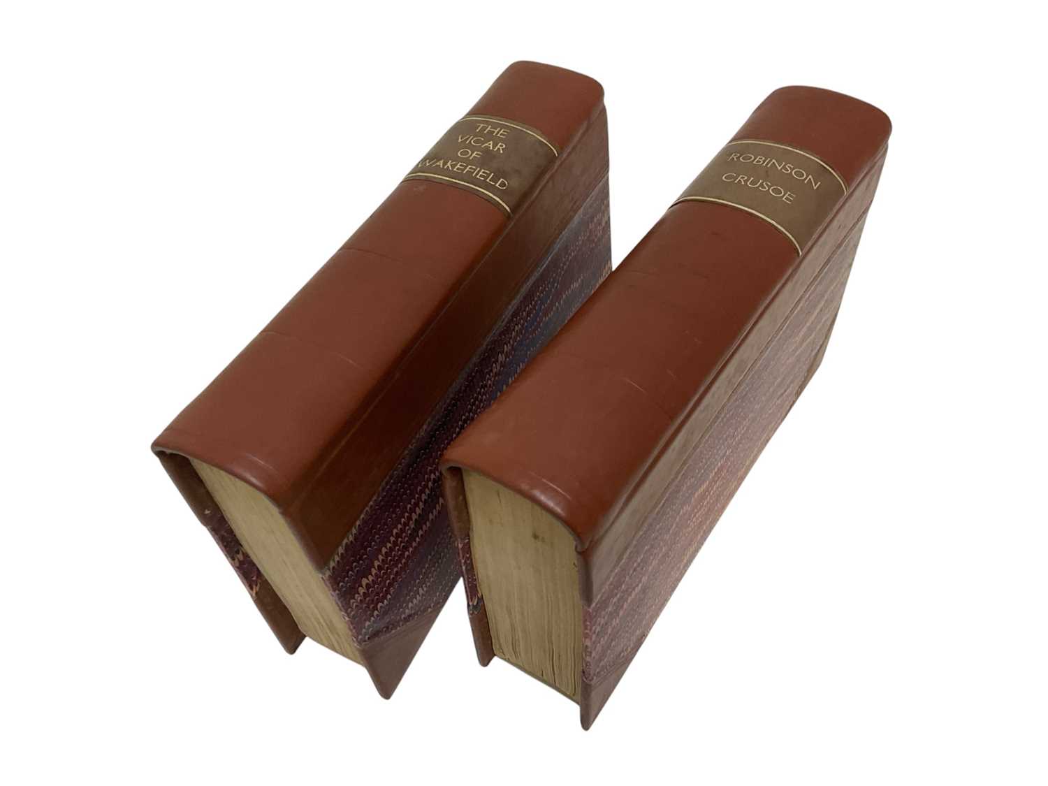 Lot 1659 - Daniel Defoe - Robinson Crusoe, London 1791, appears to be Vol. 1 only of two, bound with others, also The vicar of Wakefield, bound with others, in modern bindings