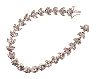Lot 623 - Diamond bracelet with a leaf design in 18ct white gold setting
