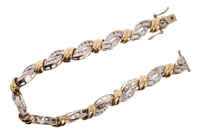 Lot 624 - 14ct white and yellow gold diamond bracelet