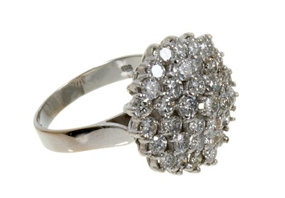 Lot 564 - Diamond cluster ring with a hexagonal cluster of brilliant cut diamonds in tiered claw setting on 18ct white gold shank