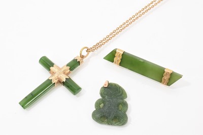 Lot 566 - Antique Māori hei tiki green nephrite jade/hardstone pendant, similar cross pendant with gold mounts on chain and similar brooch (3)