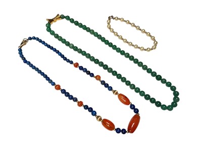 Lot 168 - Lapis lazuli and carnelian bead necklace with 9ct gold clasp and spacers, green hardstone bead necklace with gold bow clasp (stamped 14k), and a cultured pearl bracelet with gold spacers and cla...